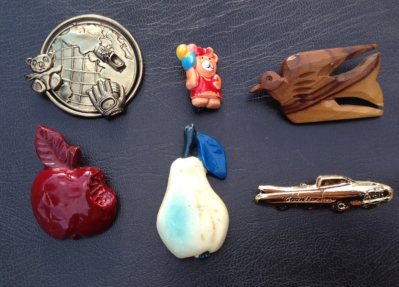 six vintage brooches